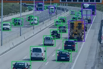 Traffic scene with machine-learning object detection boxes